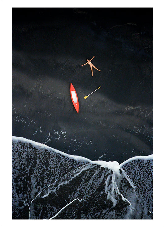 Nude and red canoe